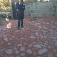 سیمان کاری سیاه و سفید و سنگ فرش