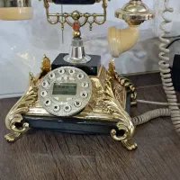 تلفن قدیمی مشکی طلایی
