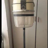 وسایل ارایشگاهی صندلی با سشوار کلاهی باهم ۴۰۰۰۰۰۰