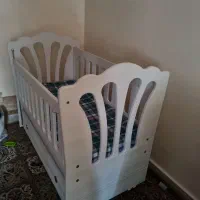 تخت گهواره‌ای کودک