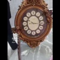 ساعت دیواری شیک  مجسمه دارقهوایی