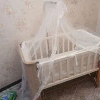 گهواره متحرک و تخت نوزاد