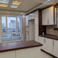 اباذر-116متر-2خوابه-9ساله-نما-تراورتن