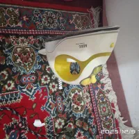 اتو لباس ب شرط  در حد نو