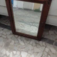آیینه بزرگ با قاب چوبی