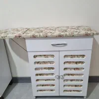 میزاتو و چرخ خیاطی