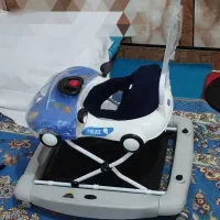 روروک کاملا نو خوش رنگ وخوش طرح موزیک دار|کالسکه و لوازم جانبی|دزفول, |دیوار