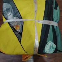 تعدادی پتو و روبالشی نو و استفاده‌نشده (تک‌نفره)