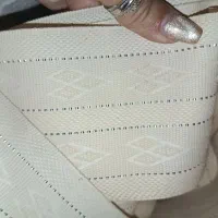 پرده عمودی کرم روشن با چوب پرده