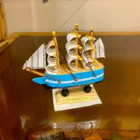 فنگشویی کشتی کاسه تبتی و بادزنگ و کره کریستال و..