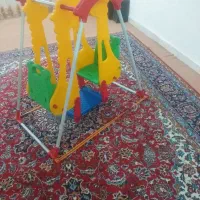 تاب زرافه ای بازی کودک