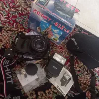 دوربین عکاسی باتمام لوازم جانبی و کارتن