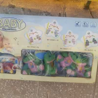 موزیکال بالای تخت بچه وپشه بند
