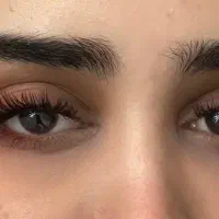 کاشت و ترمیم  اکستنشن مژه فقط با هزینه مواد