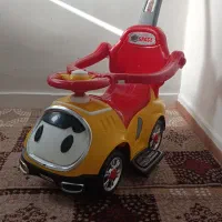 ماشین چهار چرخ دسته دار