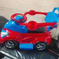 ماشین چهارچرخ دسته دار