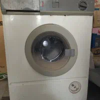 یک عدد لباسشویی