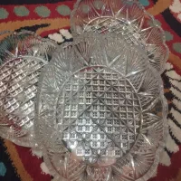 تعدادی ظروف و آب پرتقال گیر