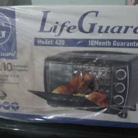 یک عدد جارو برقی ویک عدد تستر مشکی