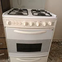 گاز چهار شعله تکنو با فر و جوجه گردان