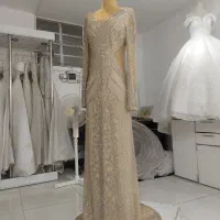 لباس مجلسی جنس ترک رنگ کرم استخوانی، شیک و سنگ‌کار