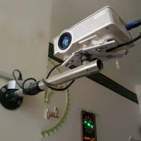 دینا پرژکتور خانگی با پرده سینما برقی