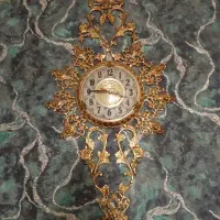 ساعت دیواری برنزی