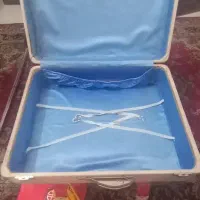 چمدان لباس کارکرده