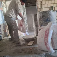 شاگرد گچکار و گچکار