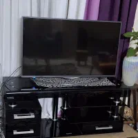 میز تلویزیون شیشه ای