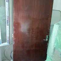 درب چوبی کارکرده با روکش گردو