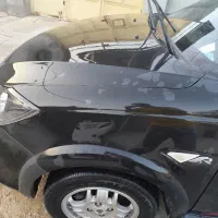 کوئیک r مشکی قرمز مدل ۱۴۰۱