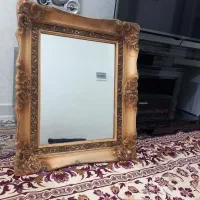 اینه با قاب چوبی