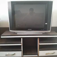 تلویزیون ۲۹ اینچ با میز تلویزیون