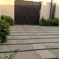 ویلا باغ ۶۰۰متری سنددار آب برق گاز چهاردیواری