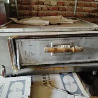 فروش یک دستگاه یخچال فریزر ویک عدد فر پیتزا صندوقی