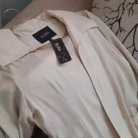 فروش مانتو نو کرم رنگ سایز ۴۲ مزون دوز مدل جدید