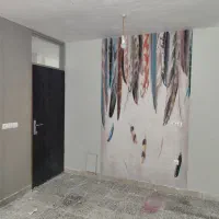 نصاب کاغذ دیواری و دوربین مداربسته