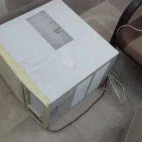 کولر گازی پشت پنجره ایی