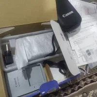 دوربین دیجیتال مدل sx600 کانن با آک فرقی نداره