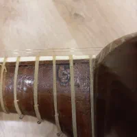 تار قدیمی سه مهر استاد چایچی|سازهای سنتی|همدان, |دیوار