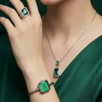 ست زنانه ساعت و گردنبند و انگشتر مدل زمرد-نقره ای
