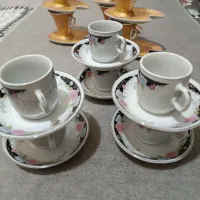 دو دست فنجان قهوه خوری