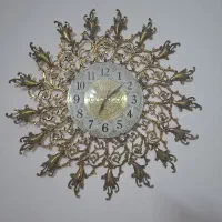 ساعت دیواری برنزی و میز تلوزیون برنزی