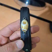 دستبند چرم با سنگ باباقوری