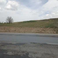 زمین آبی باسند کنار جاده اصلی
