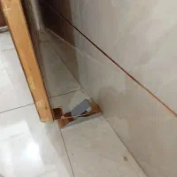 نگه دارنده درب ساختمان