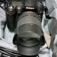 Nikon D90 به همراه کوله و سه پایه