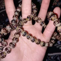 تَسبیح زندان باف،هَسته خُرما