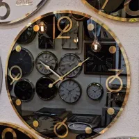 ساعت دیواری آینه ای مدل نیومدرن